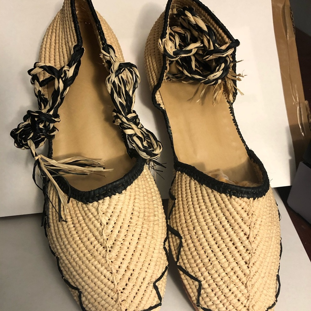 100 hand crafted leather/straw Moroccan shoes variable styles and sizes .